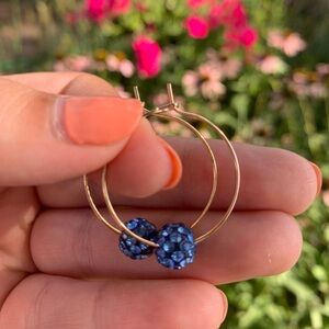 NWOT gold hoop wire earrings with blue sparkle bead.